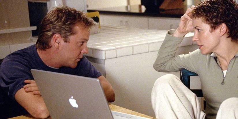 Jack (Kiefer Sutherland) talking to Teri (Leslie Hope) at their table in 24 season 1, episode 1.