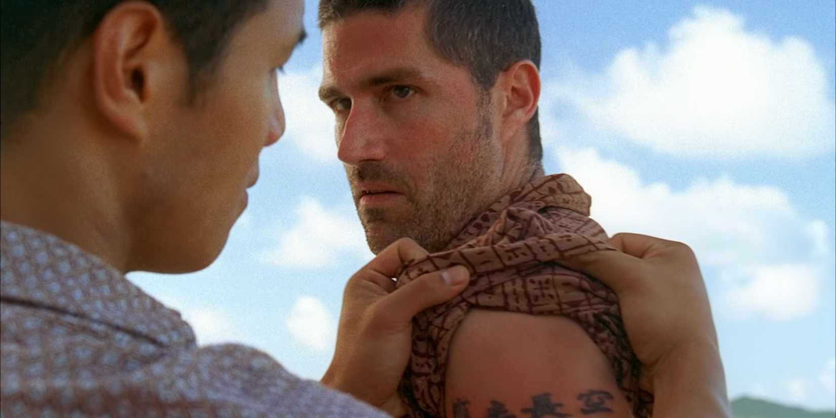 JAck Shephard getting his tattoos scrutinized in Lost