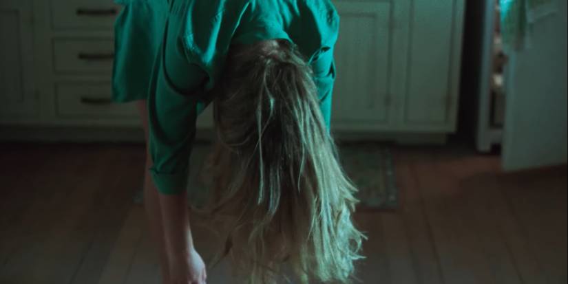 Jennifer Lawrence as Grace bending in half in Die My Love