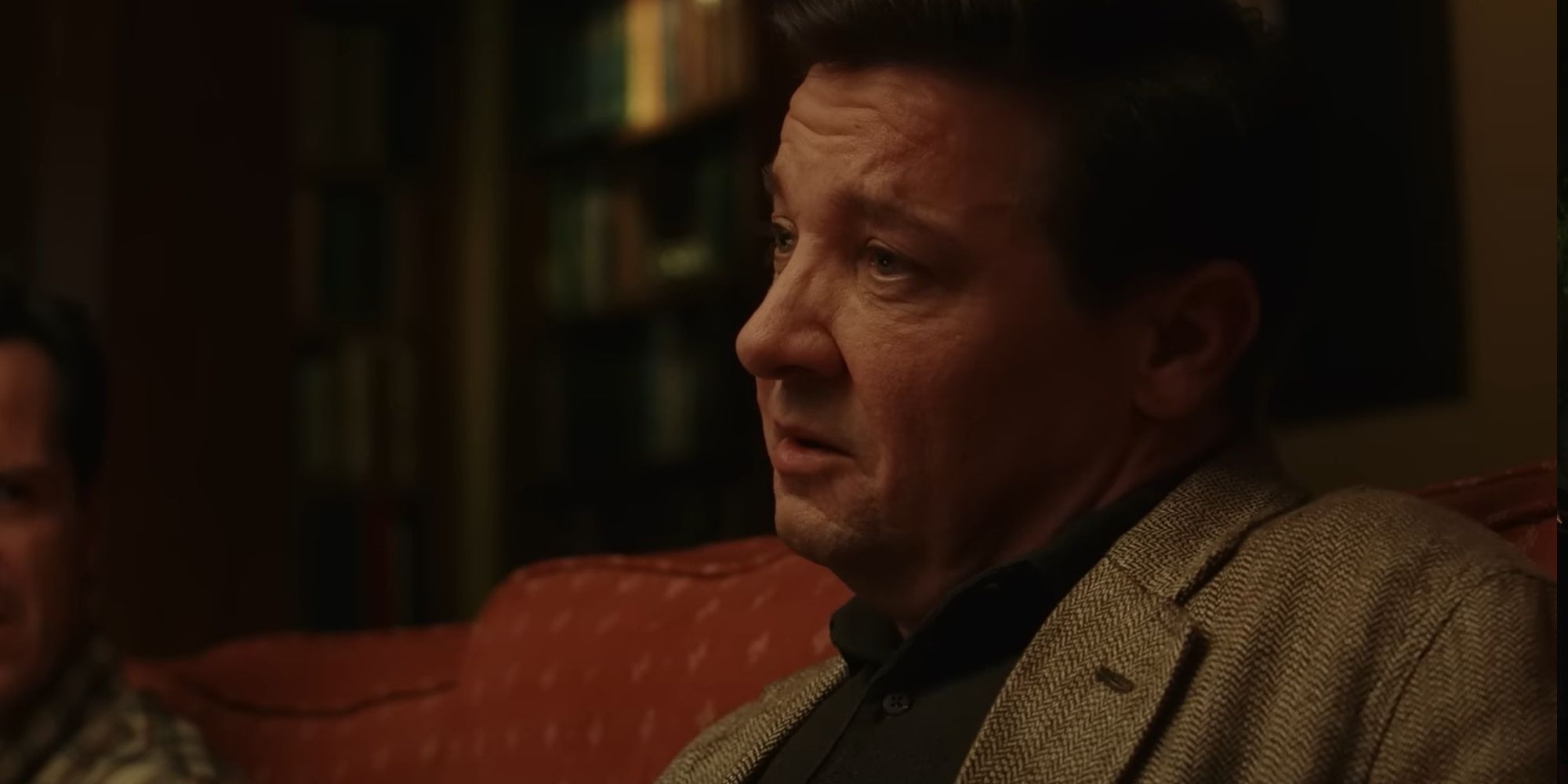 Jeremy Renner as Dr. Hart in Wake Up Dead Man