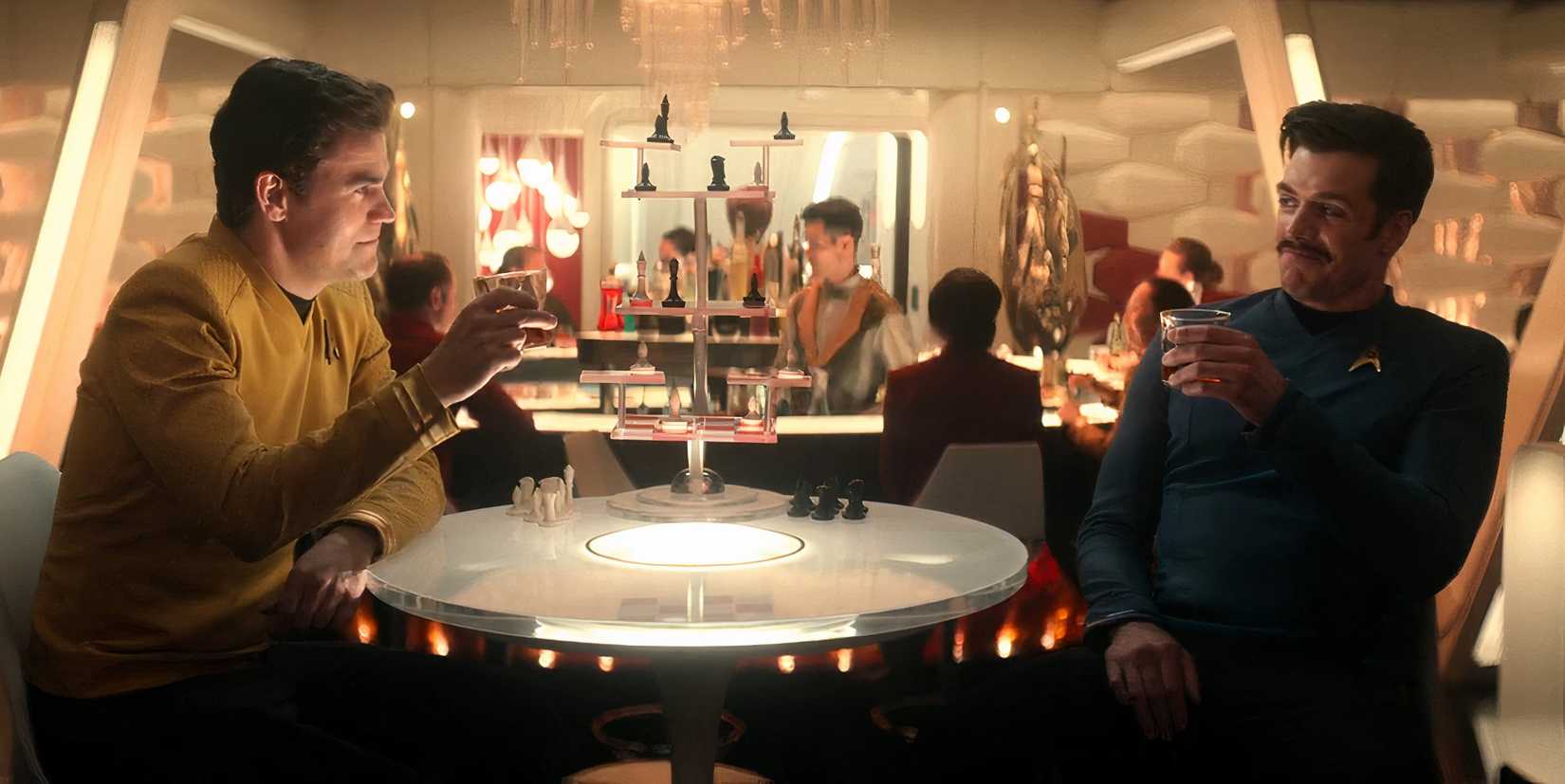 Jim and Sam Kirk toasting in Star Trek Strange New Worlds
