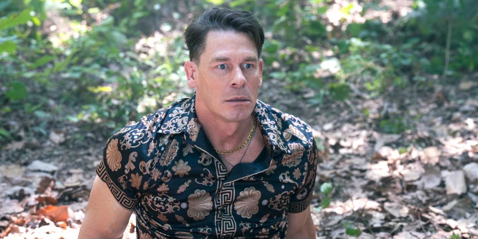 John Cena as Peacemaker in civilian clothes looking scared in Peacemaker season 2