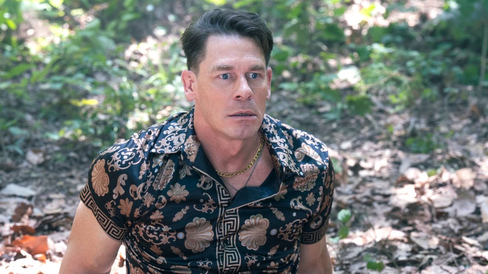 John Cena as Peacemaker in civilian clothes looking scared in Peacemaker season 2