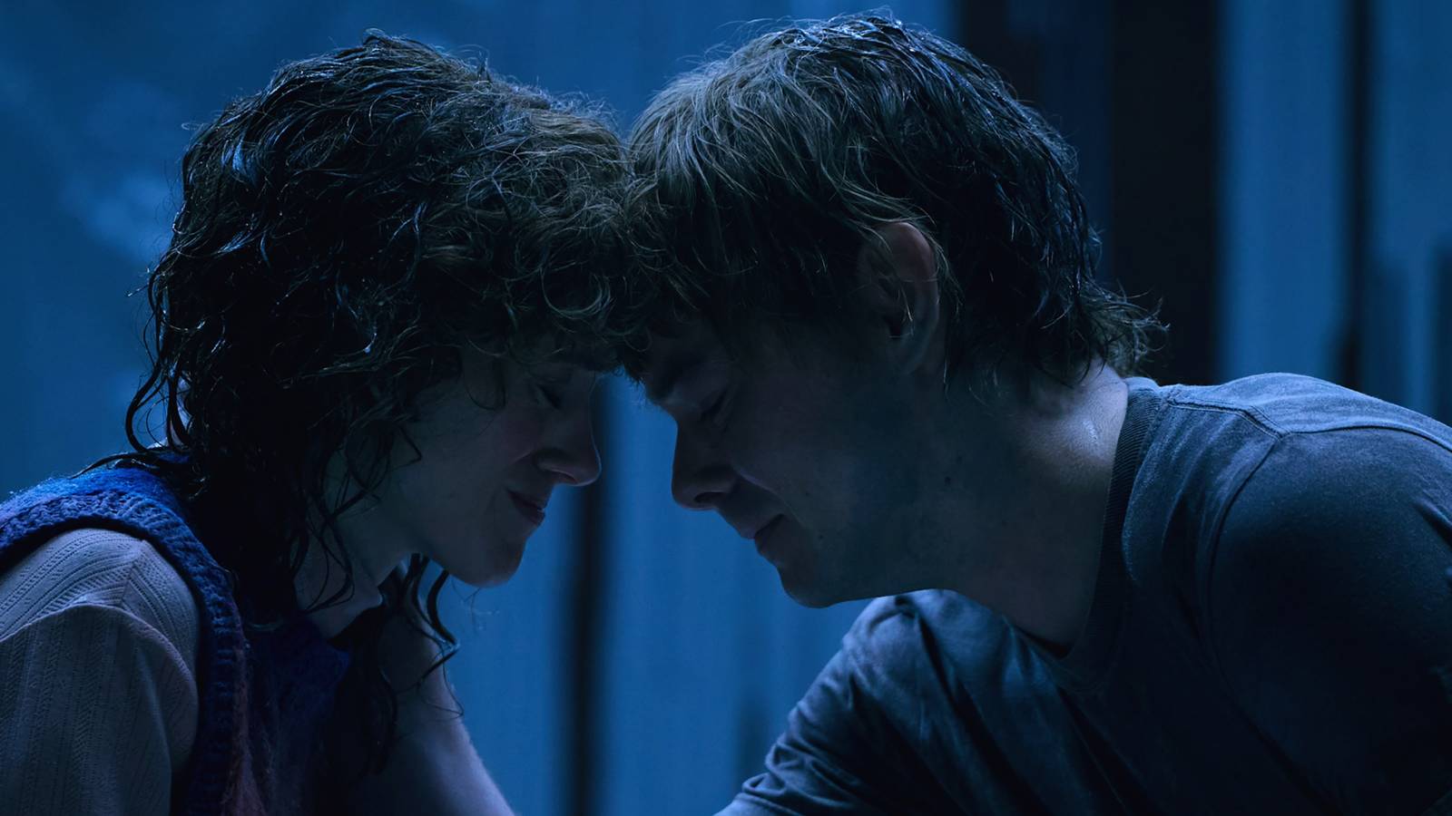 Jonathan and Nancy press their foreheads together in crisis in Stranger Things season 5
