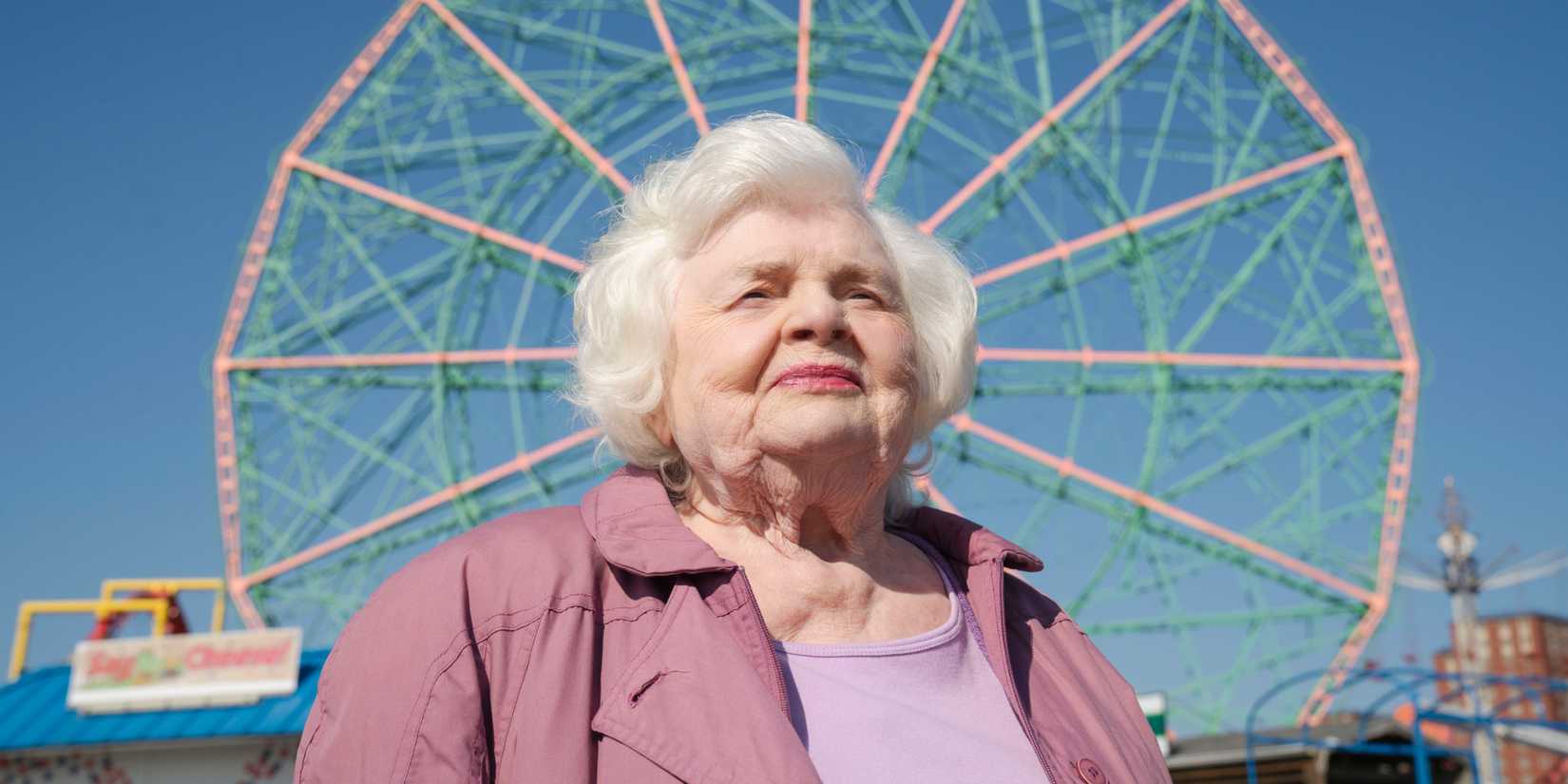 June Squibb in front of the Coney Island ferris wheel in Eleanor the Great