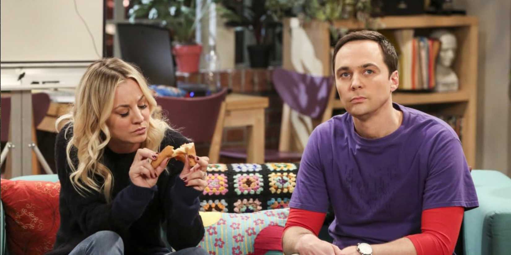 Kaley Cuoco's Penny toys with bread as Jim Parsons' Sheldon ponders in The Big Bang Theory