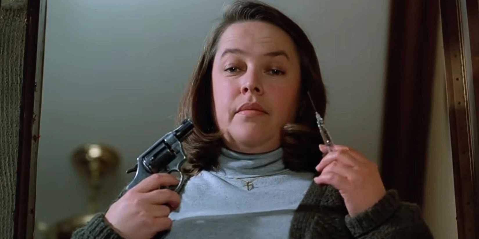 Kathy Bates como Annie Wilkes em Louca Obsessão