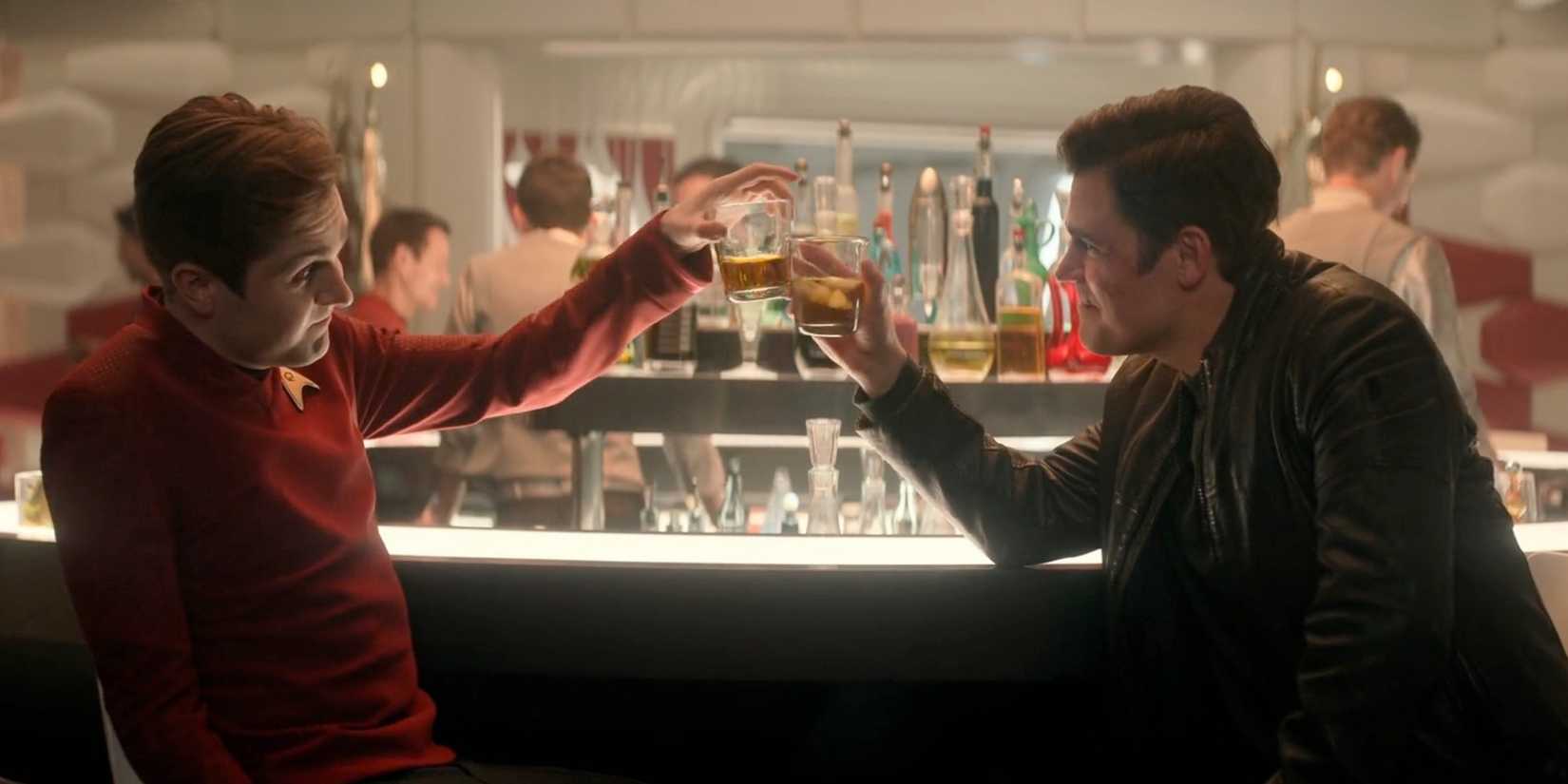 Kirk and Scotty having drinks in Star Trek Strange New Worlds Four and a half Vulcans