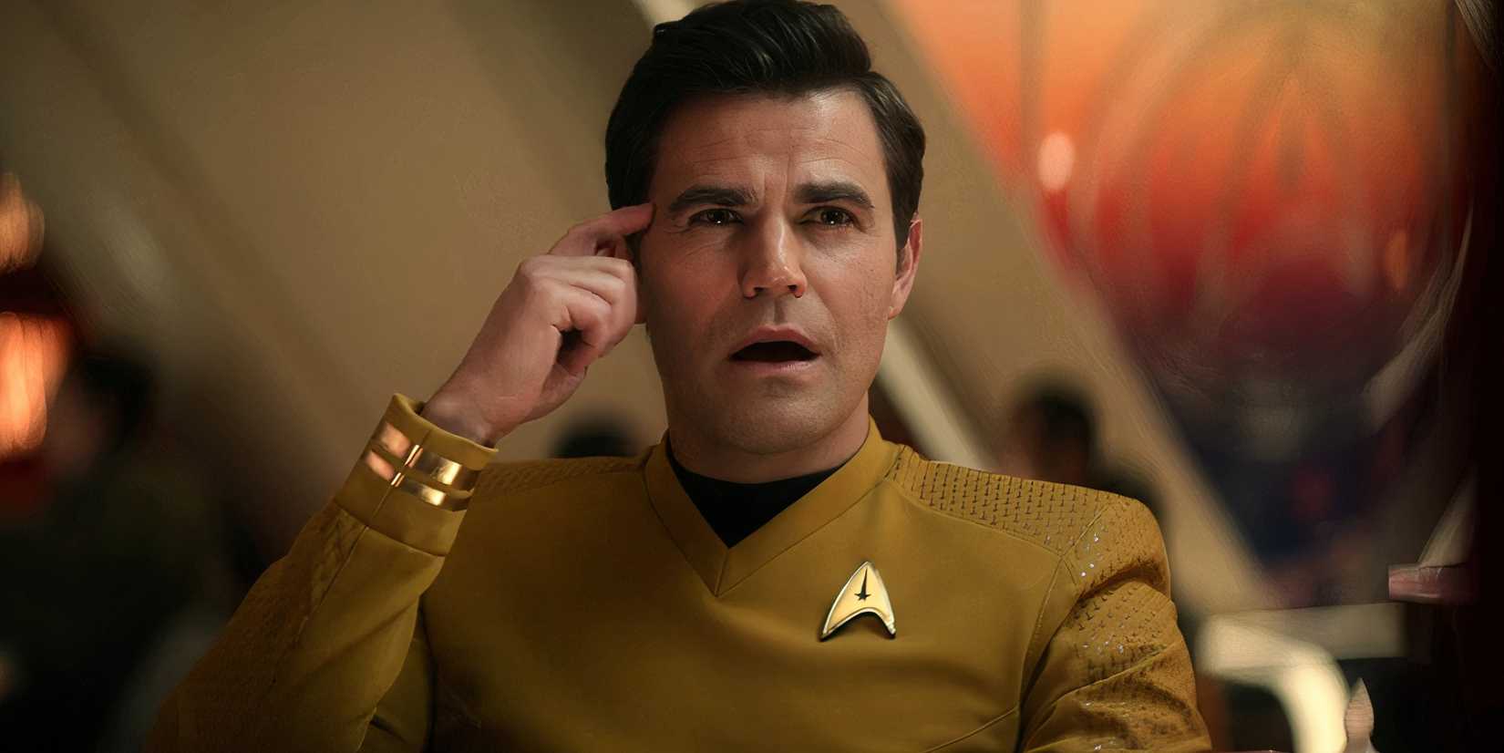 Kirk pointing to his head