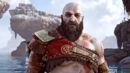 Kratos standing on a beach in God of War Ragnarok.