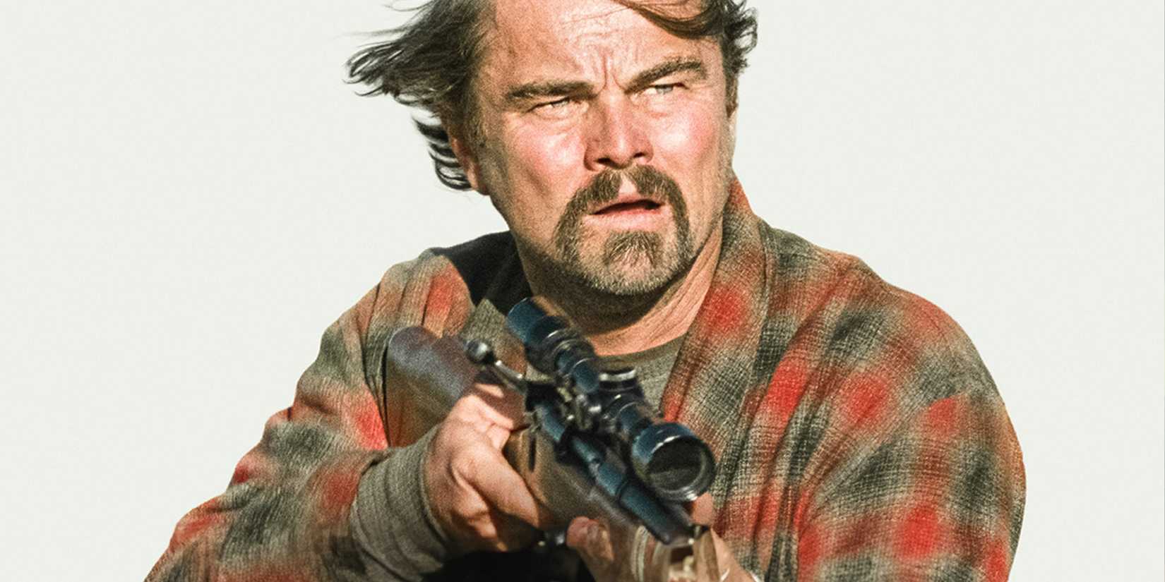 aleonardo dicaprio holding a gun in one battle after another