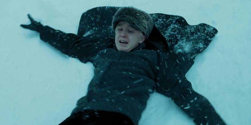 Malfoy being dragged through the snow in Harry Potter and the Prisoner of Azkaban