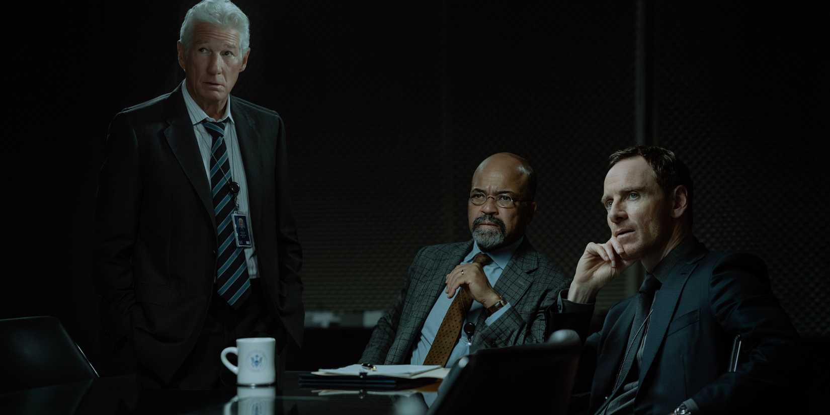 Michael Fassbender, Jeffrey Wright, and Richard Gere looking concerned