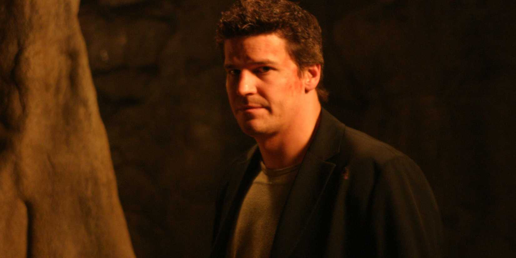 Mid-shot of David Boreanz as Angel in the Buffy spinoff Angel, staring directly at the camera