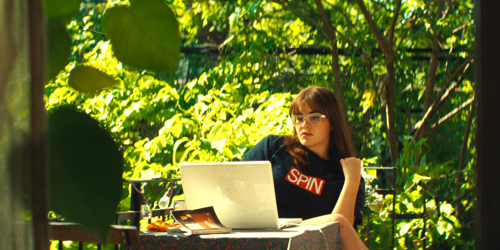 Barbie Ferreira working on her laptop in Mile End Kicks