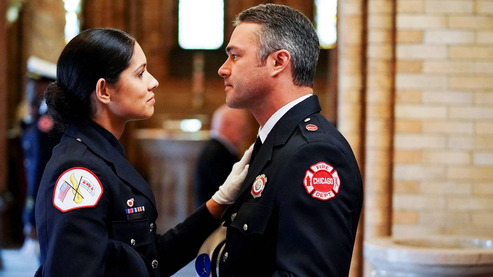 Miranda Rae Mayo as Stella Kidd and Taylor Kinney as Kelly Severide in Chicago Fire