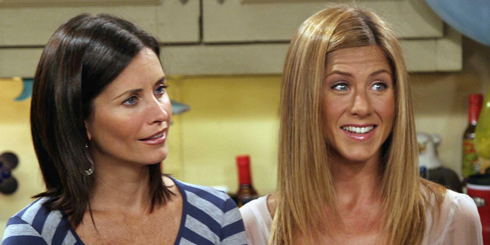 Monica and Rachel looking confused at Emma's birthday party in Friends season 10