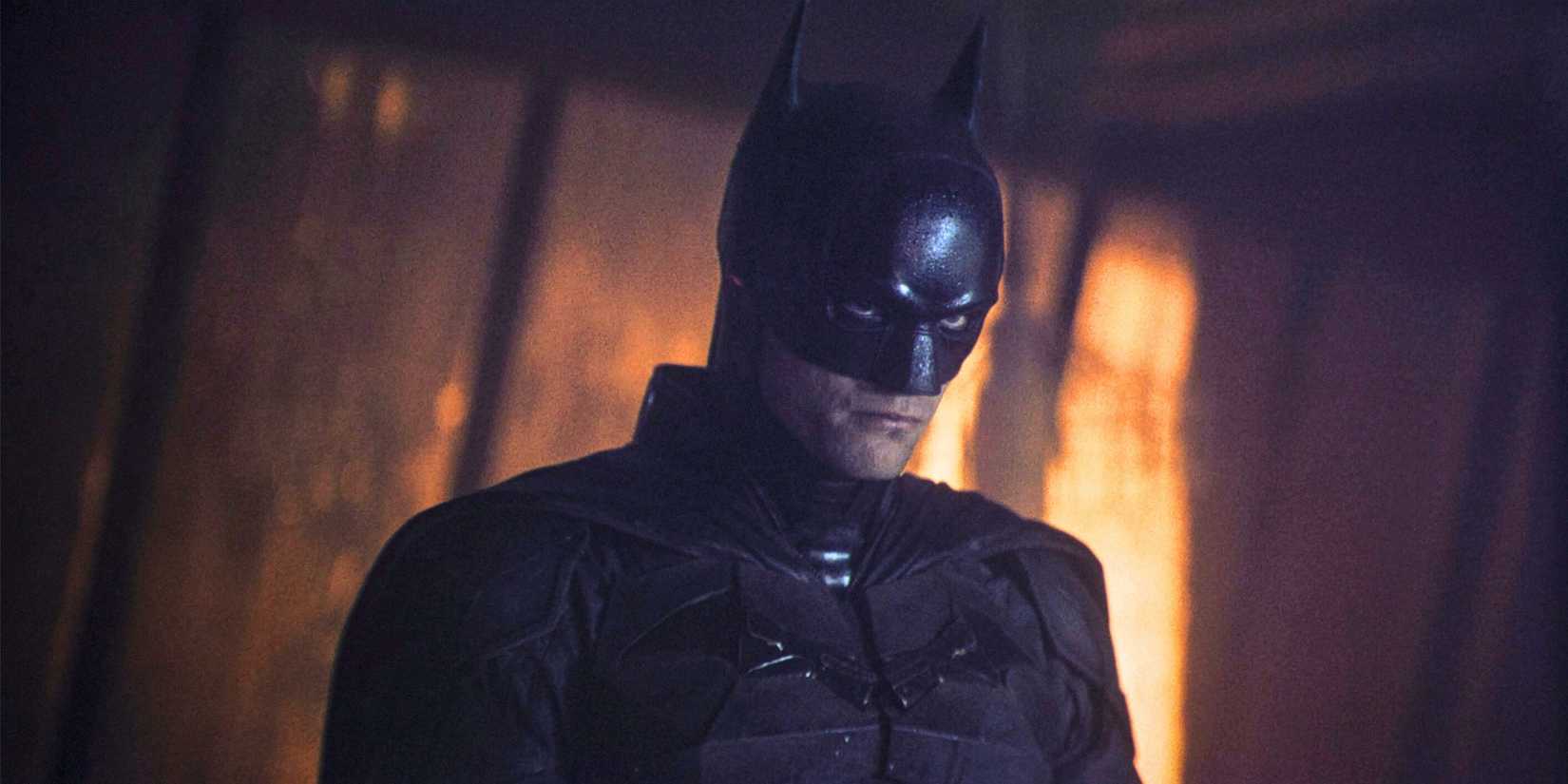 Robert Pattinson looking intense while suited up as the Dark Knight in The Batman