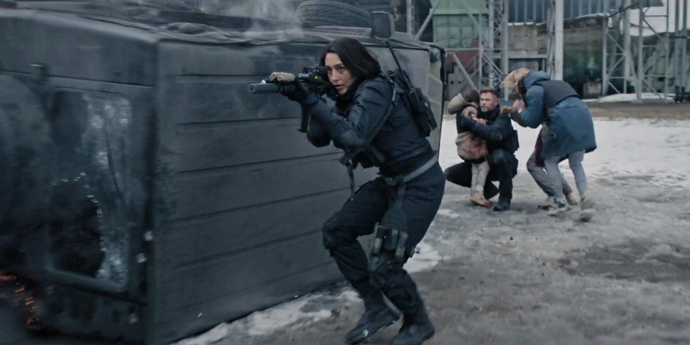 Golshifteh Farahani aiming a rifle as Nik in Extraction 2