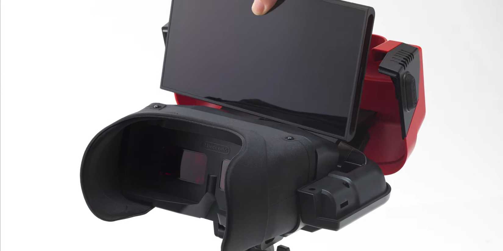 Alguém inserindo um Nintendo Switch 2 no garoto virtual.