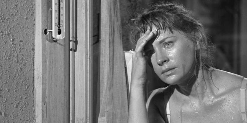 Norma suando e preocupada na janela no episódio