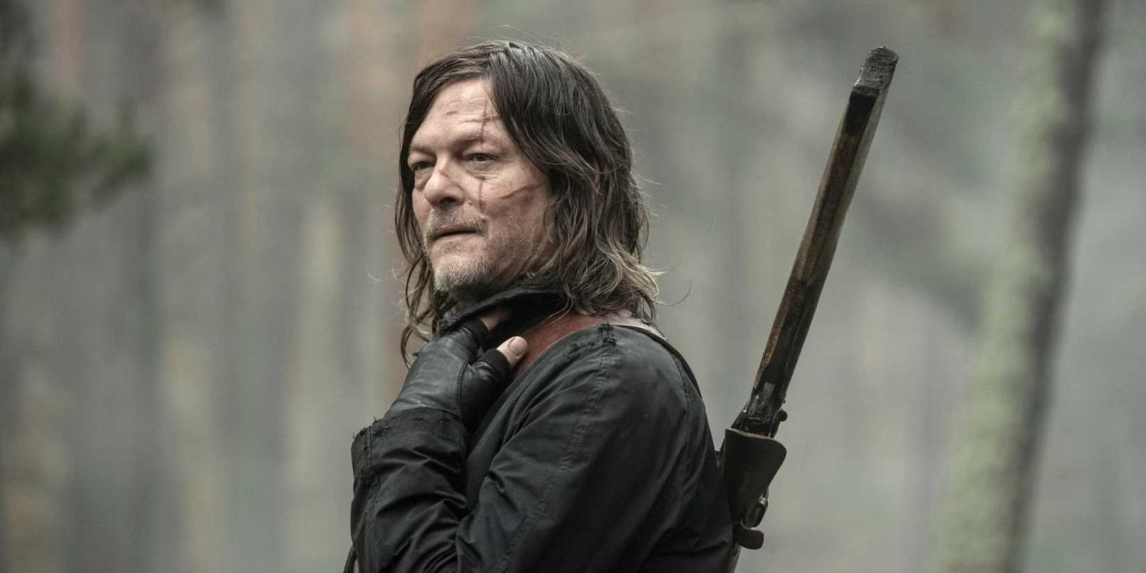 Norman Reedus as Daryl with scars on his face and a shotgun slung over his back in The Walking Dead Daryl Dixon season 3 episode 4