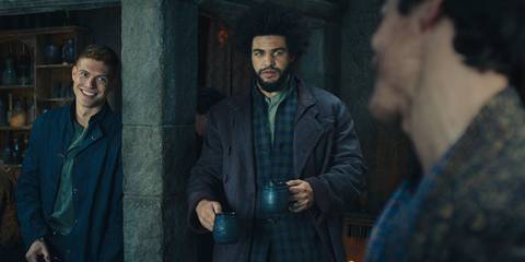 Rand and Perrin enjoying a conversation in a tavern in The Wheel of Time-2