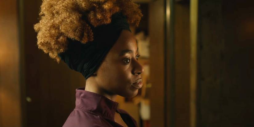 Rayelle looking off to the side in We Strangers
