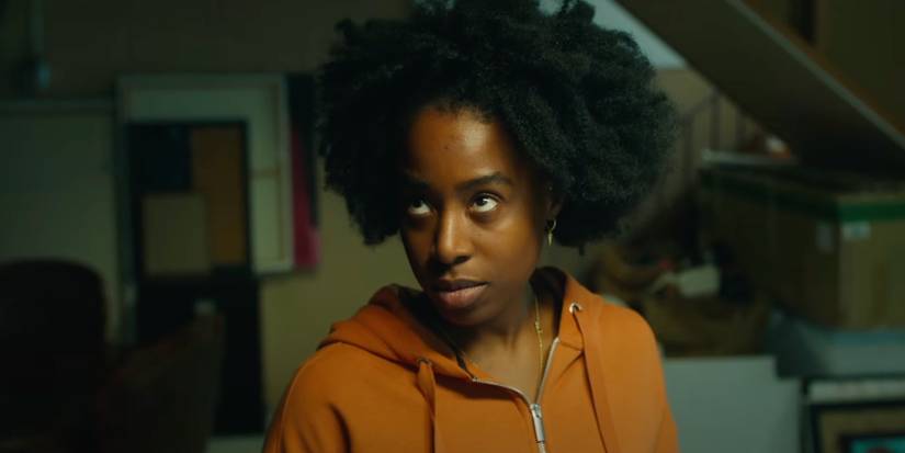 Rayelle looking up and disbelieving in We Strangers