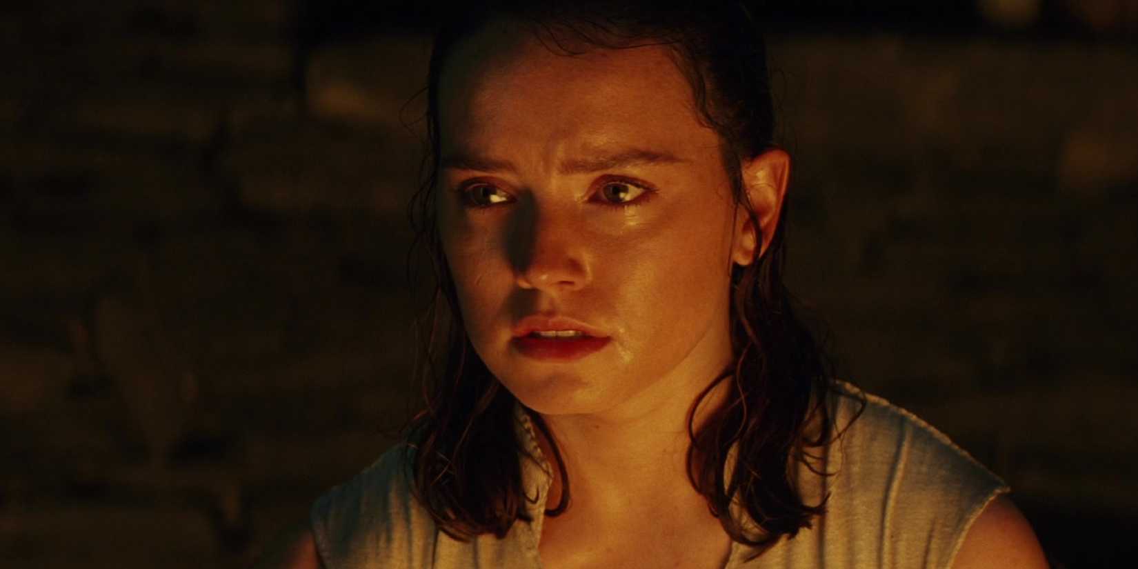 Rey looks at Kylo Ren in The Last Jedi