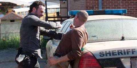 Rick takes a swing at Shane in The Walking Dead