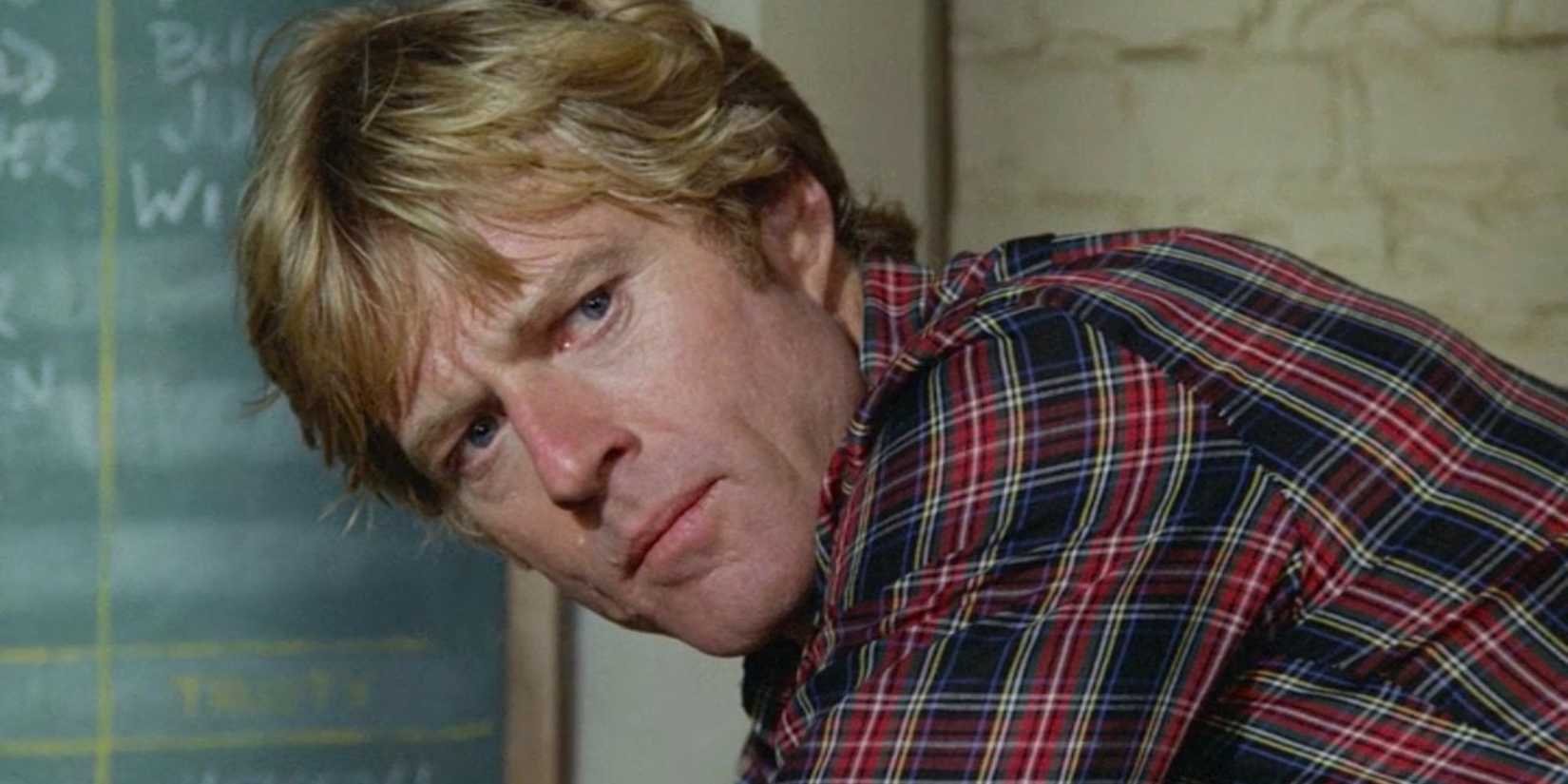 Robert Redford as Henry Brubaker looking concerned