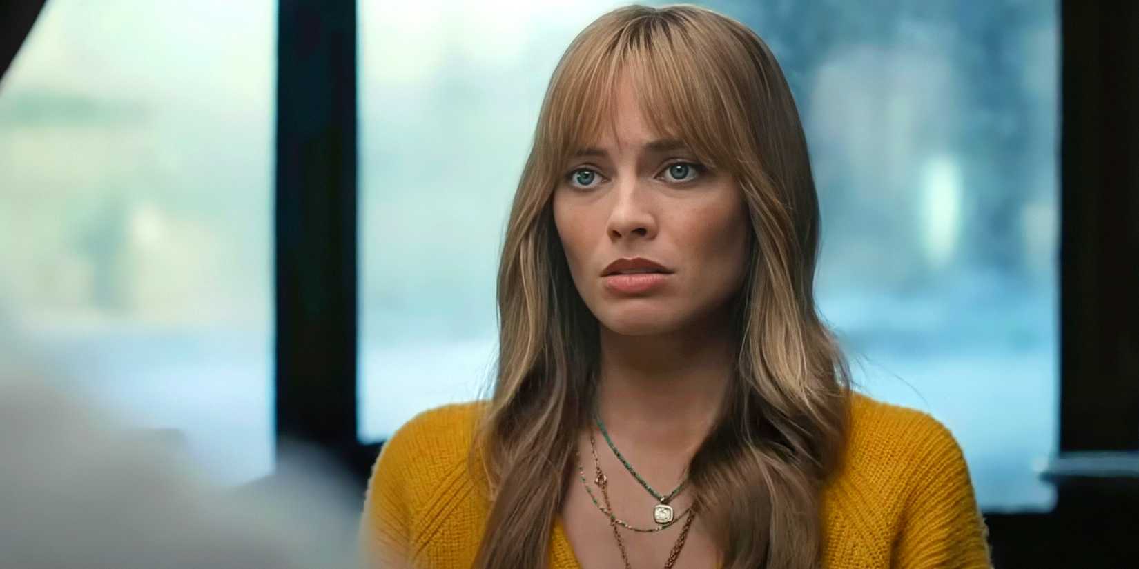 Sarah (Margot Robbie) looking heartbroken in A Big Bold Beautiful Journey