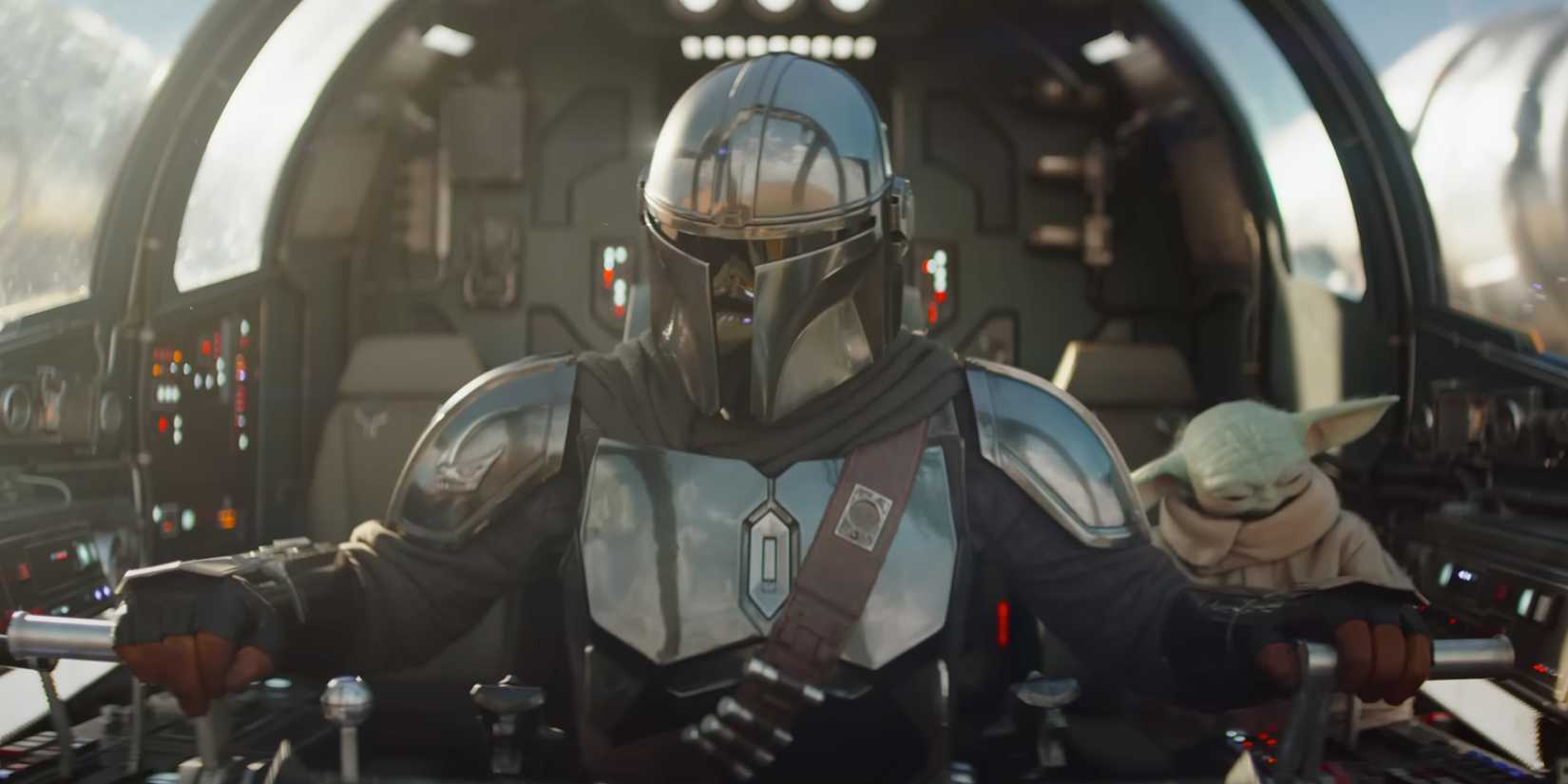 Din Djarin pulls back on the controls inside the Razor Crest, with Grogu bracing beside him.