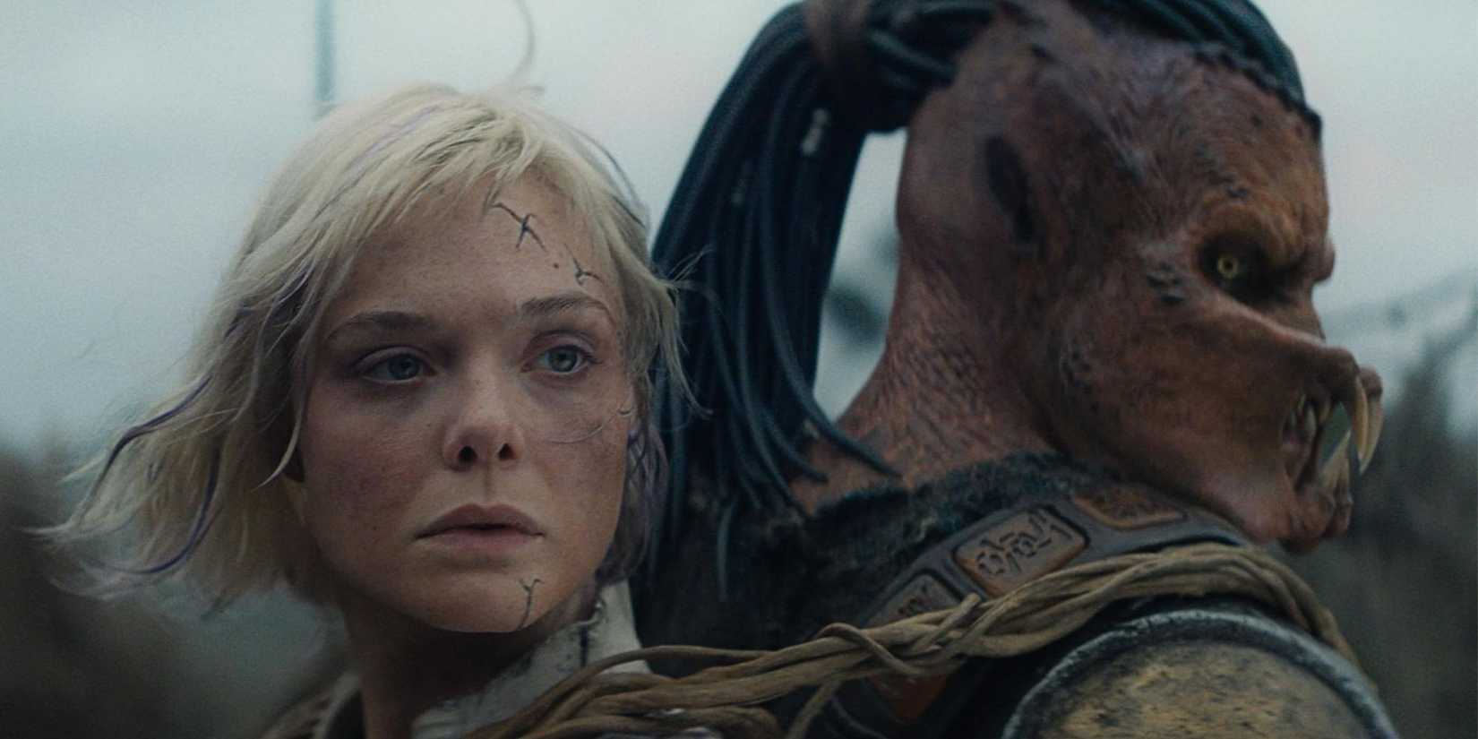 Elle Fanning's Thia and Dimitrius Schuster-Koloamatangi's Dek in Predator: Badlands