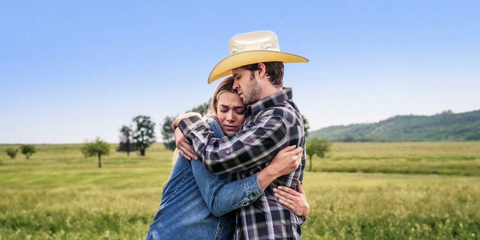 Couple hugging in front of a field, A Thousand Tomorrows