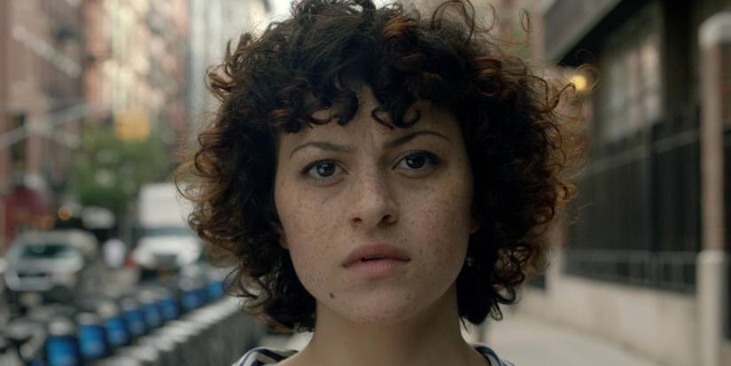 Alia Shawkat as Dory standing in the street in NYC on Search Party