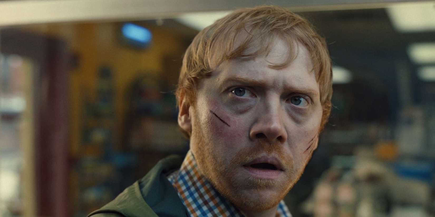 Rupert Grint looking shocked in Servant