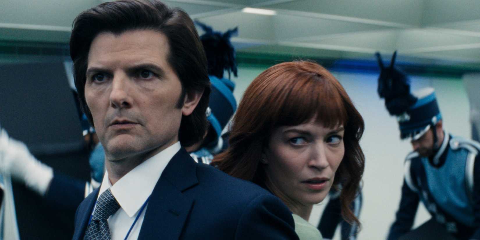 Mark and Helley are worried while surrounded by marching bands in the retirement season 2 finale