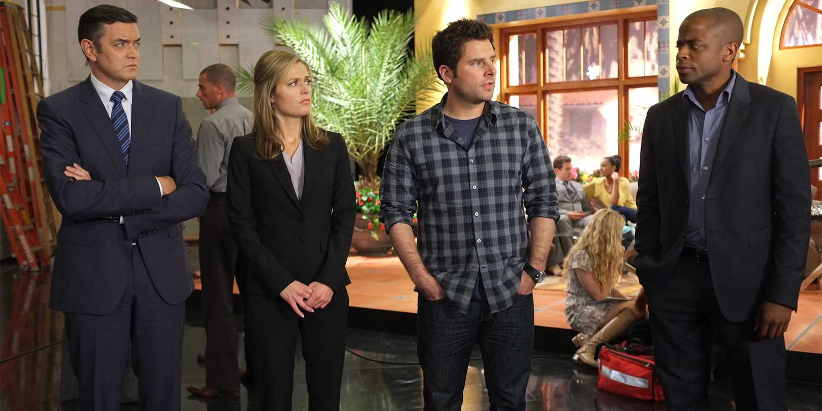 Shawn, Gus, Juliet, and Lassiter stand in a line talking on Psych