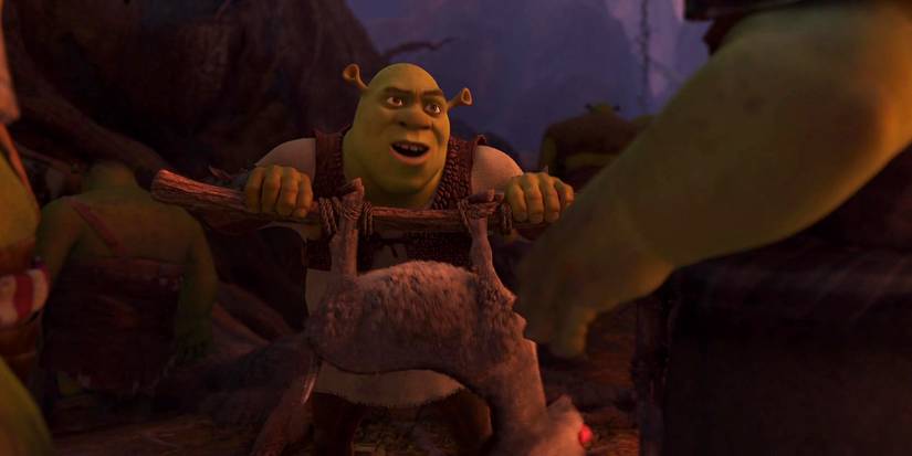 Shrek holding Donkey hanigng upside down in Shrek Forever After