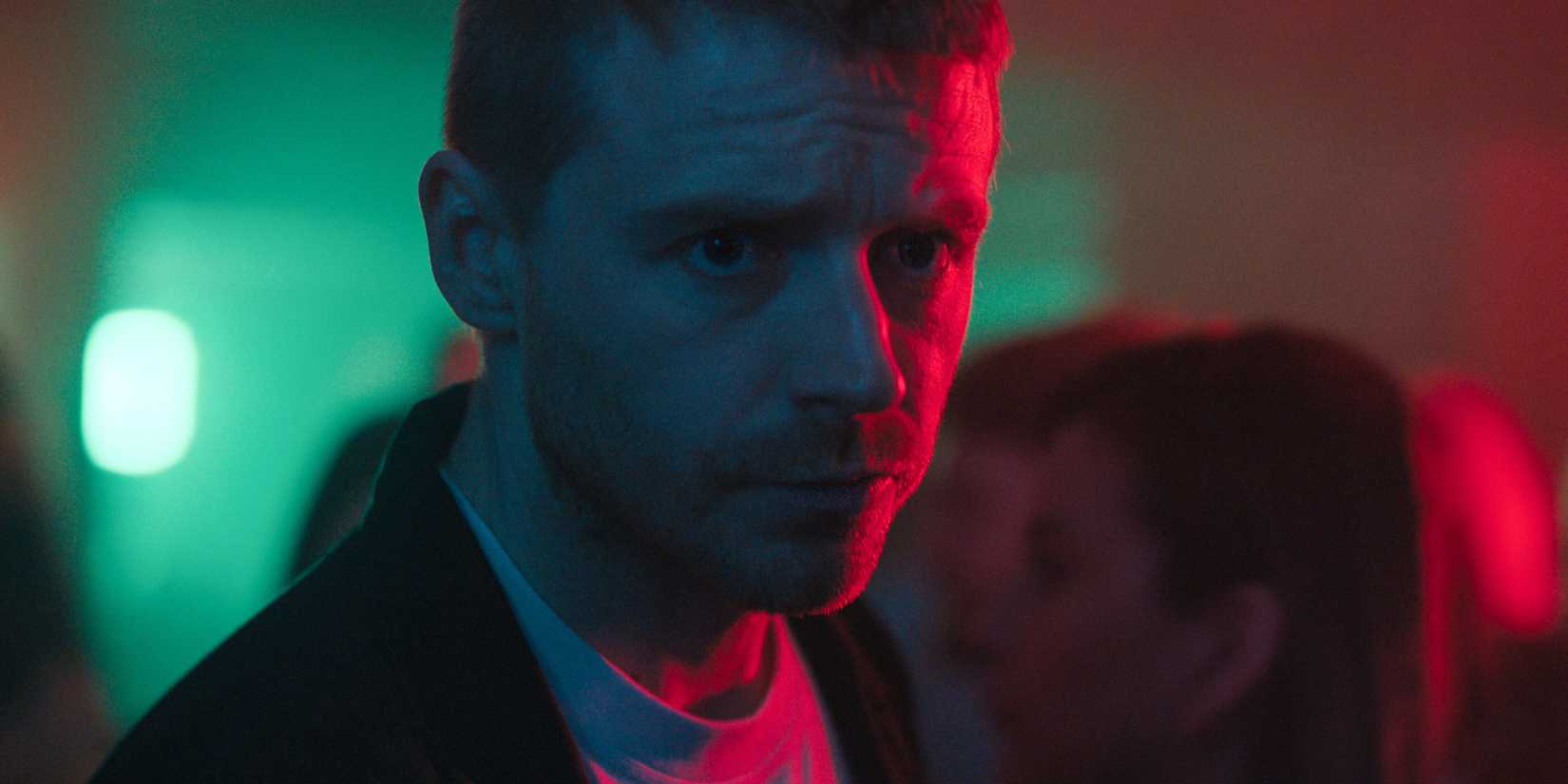 River Cartwright (Jack Lowden) looking solemn in a club in Slow Horses season 5, episode 1.