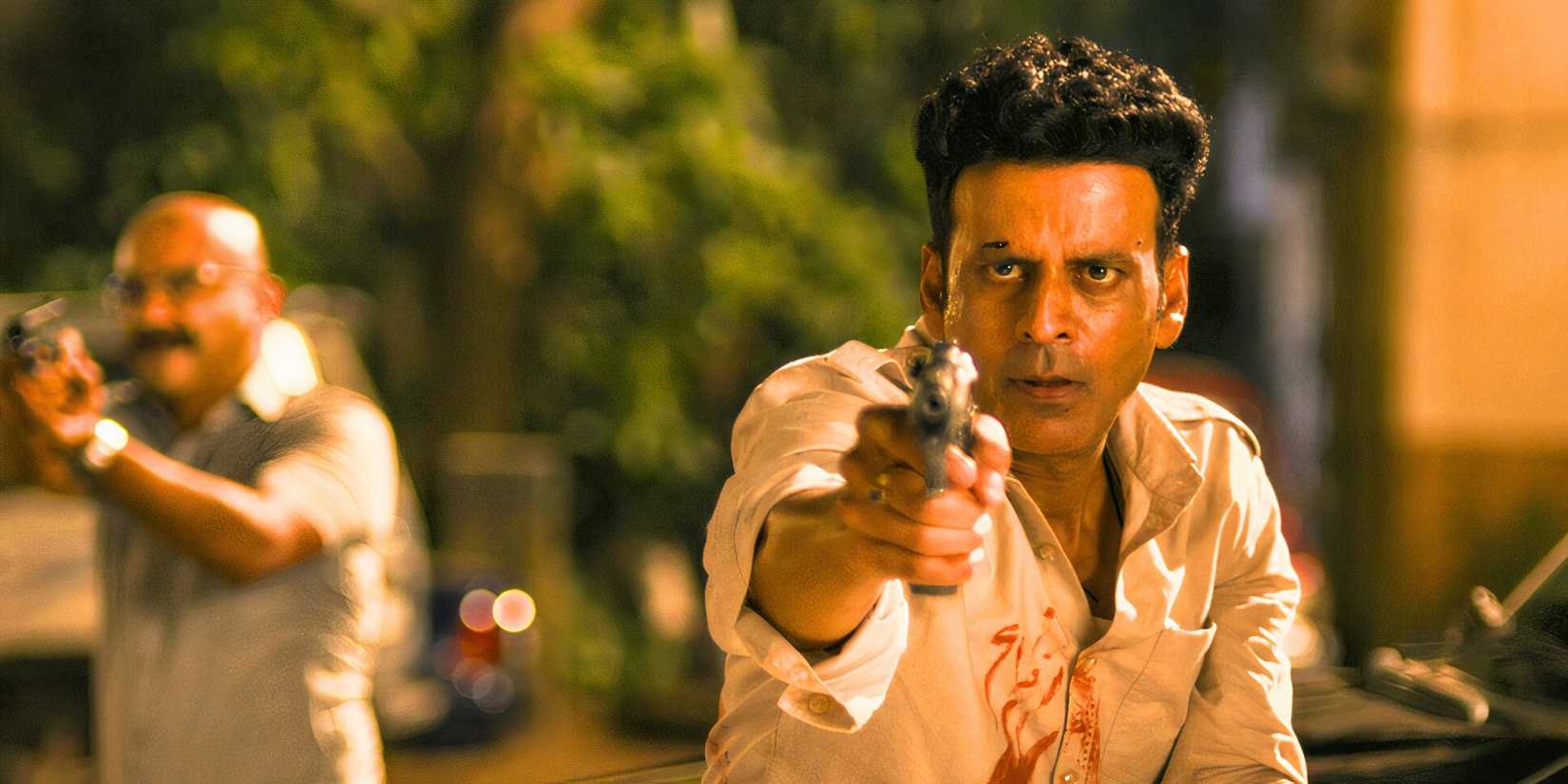 Srikant pointing a gun in Indian action show The Family Man