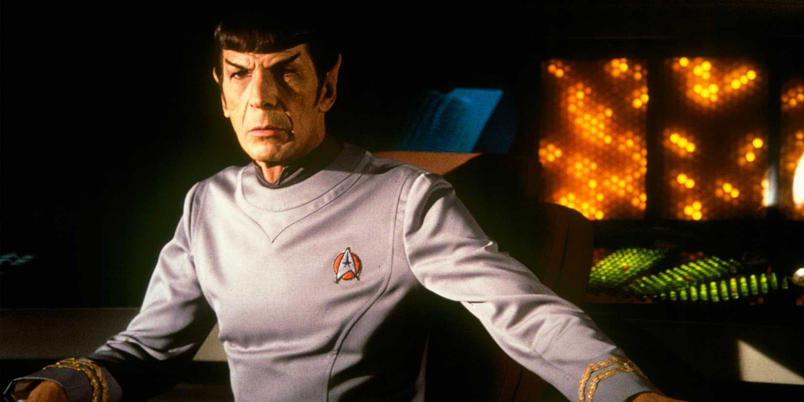 Spock looks on with concern while sitting on the darkened bridge in Star Trek: The Motion Picture
