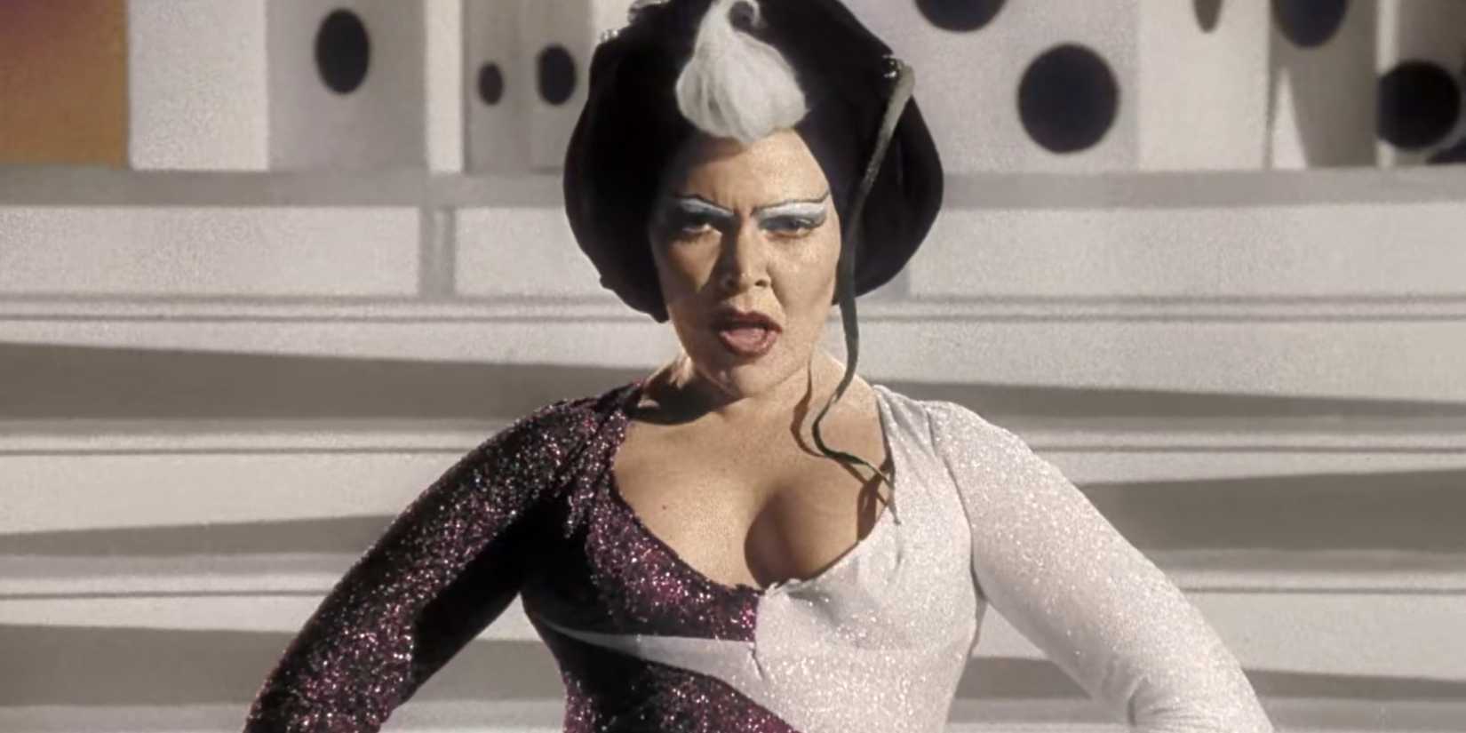 Gaudily made-up Susan Tyrrell stares dramatically forward in a scene from Forbidden Zone