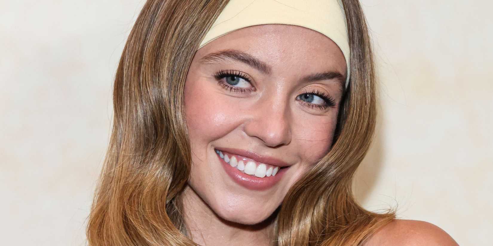 Sydney Sweeney smiling at the Los Angeles screening of 'Americana'