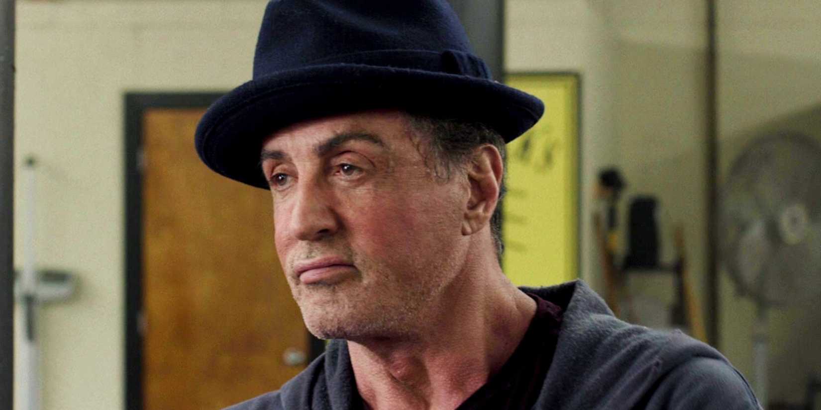 Sylvester Stallone as Rocky looking at the ring in Creed
