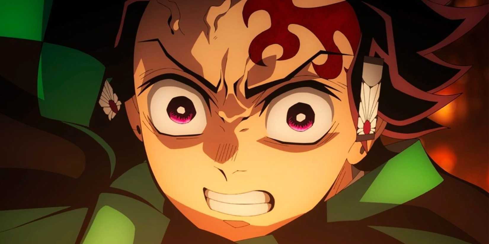 Gros plan sur Tanjiro, l'air sérieux, en plein combat dans la Forteresse Infinie