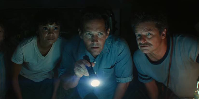 Thandiwe Newton Paul Rudd and Steve Zahn looking nervous in the dark in Anaconda 2025