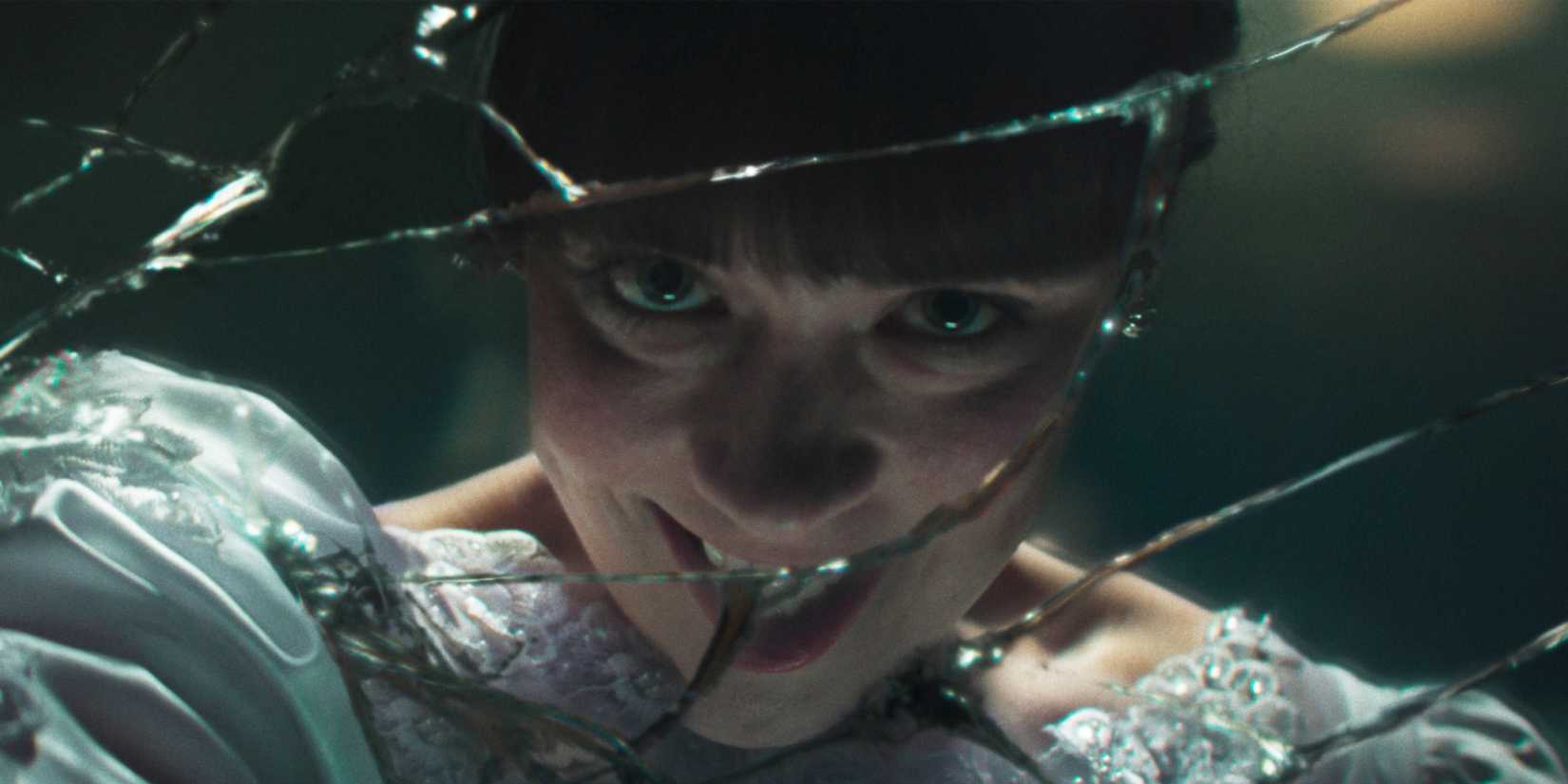 Judy smiling in the mirror in The Conjuring: Last Rites.